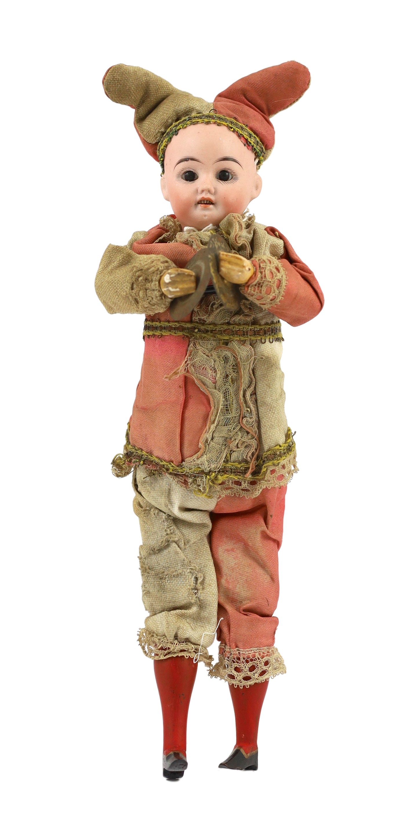 A bisque headed cymbal player, German, circa 1900, 12in.